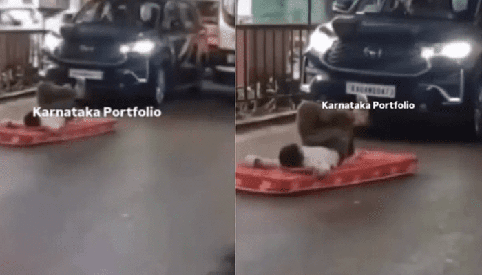 ನಡು ರಸ್ತೆಯಲ್ಲೇ ಮಲಗಿದ ಭೂಪ! – ಅಕ್ಕ ಪಕ್ಕ ವಾಹನ ಓಡಾಡಿದ್ರೂ ಡೋಂಟ್‌ ಕೇರ್!‌