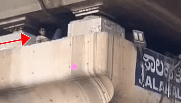 ಫ್ಲೈಓವರ್ ಪಿಲ್ಲರ್ ಪಿಲ್ಲರ್ ಹತ್ತಿ ಕುಳಿತ ಭೂಪ!  – ಮಲಗೋಕೆ ಬೇರೆ ಜಾಗನೇ ಸಿಕ್ಕಿಲ್ವಾ?